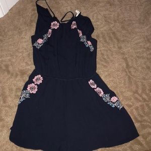 Dark blue romper with flowers